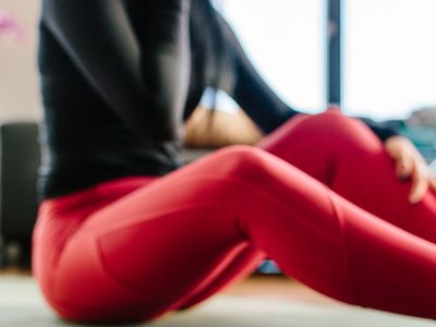 A calm and tidy space with a yoga mat on the floor.